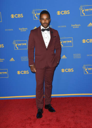 Y&R's Sean Dominic presented Lead Actress and donned a burgundy tux.